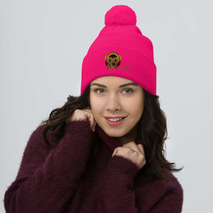 Berretto rosa neon con pom-pom